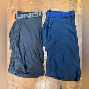 Two pair Under Armour 9” boxerjocks. Size medium.